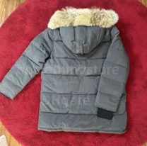 grey down jacket fur hood