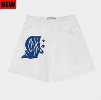 white and blue short pants