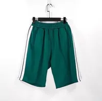 green shorts