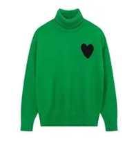 green turtleneck sweater