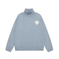 light blue turtleneck sweater