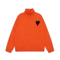 orange turtleneck sweater