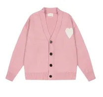 pink cardigan sweater