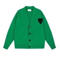 green cardigan sweater