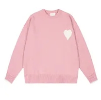 pink crew neck sweater