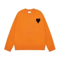 orange crew neck sweater