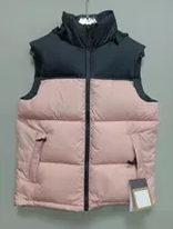 pink black puffer vest