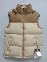 beige and brown top puffer vest